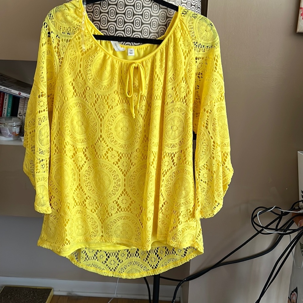 Beautiful blouse.  Buy one get one 1/2 price of equal or cheaper price